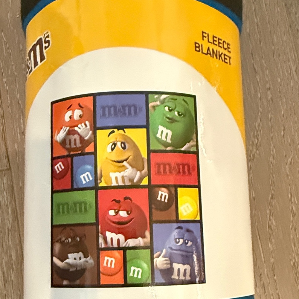 M&M'S Yellow Fleece Blanket with Multicolor Character Panel